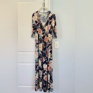 Floral Maxi Dress with Navy and Pink Accents.